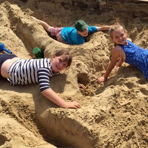 children playing in the sand