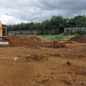 machine digging up soil