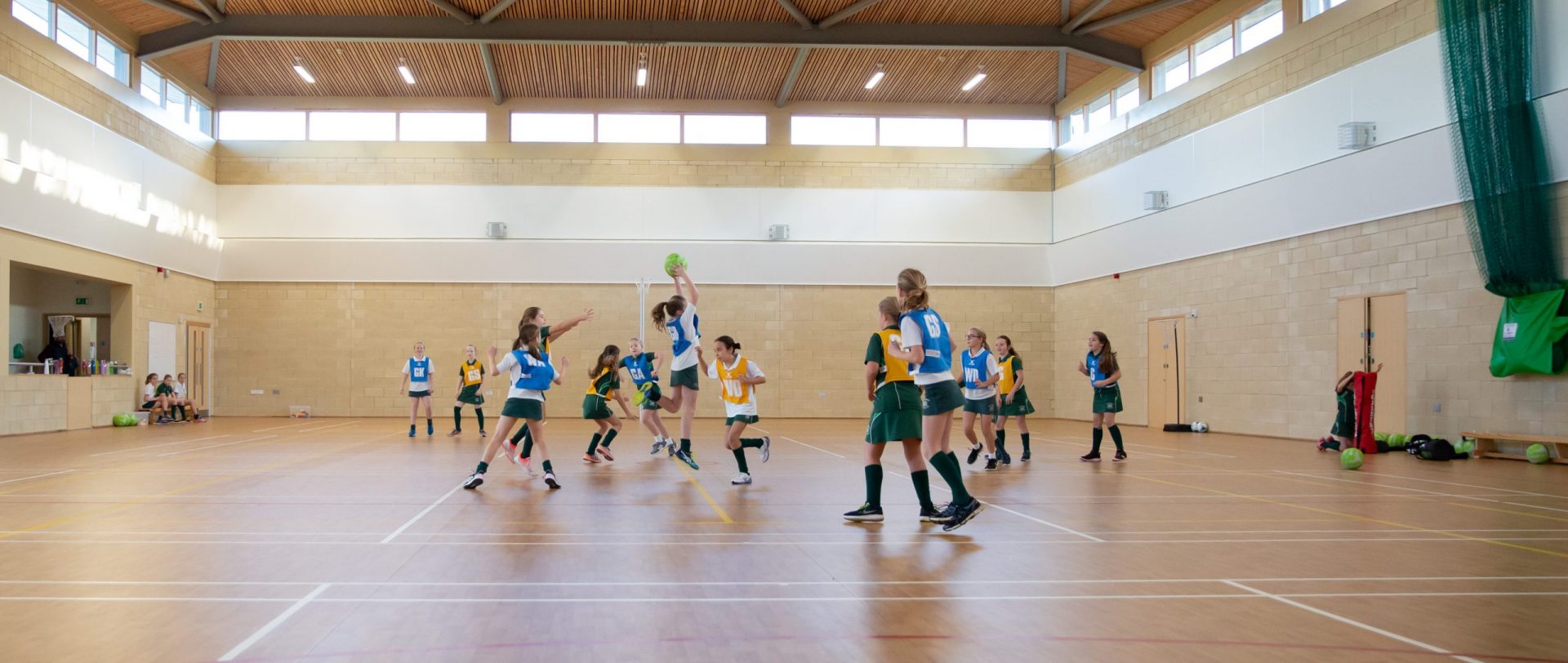 A group of Manor Prep students playing netball