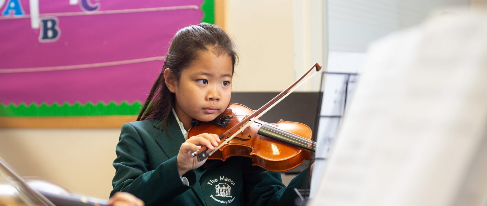 Prep student playing violin