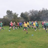 students running across the field