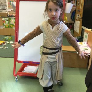 girl dressed as a jedi