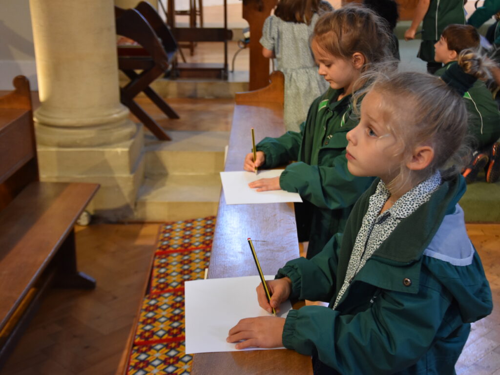 students writing on paper