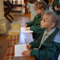 students writing on paper