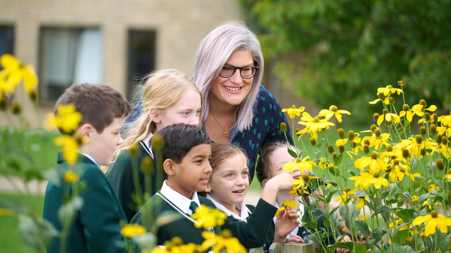 students looking at flowers