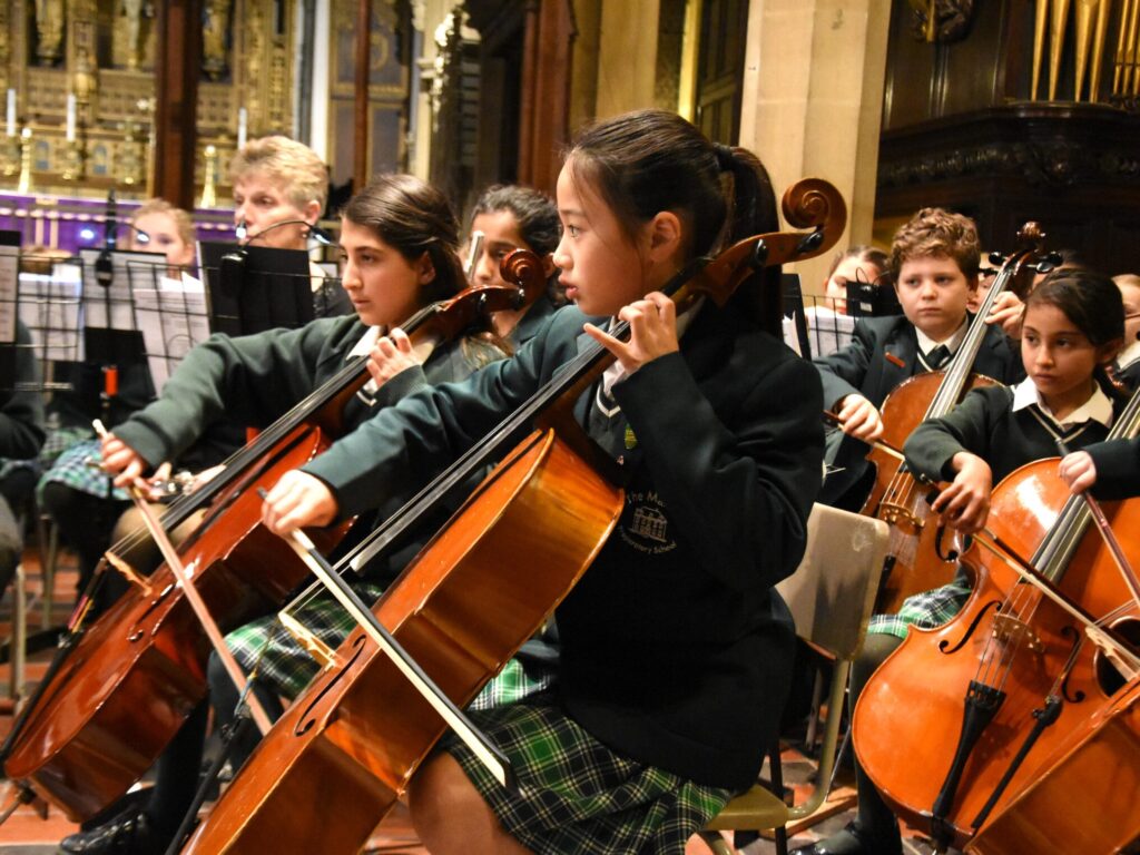 student playing stringed instruments