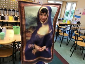 Boy dressed in Mona Lisa painting fancy dress